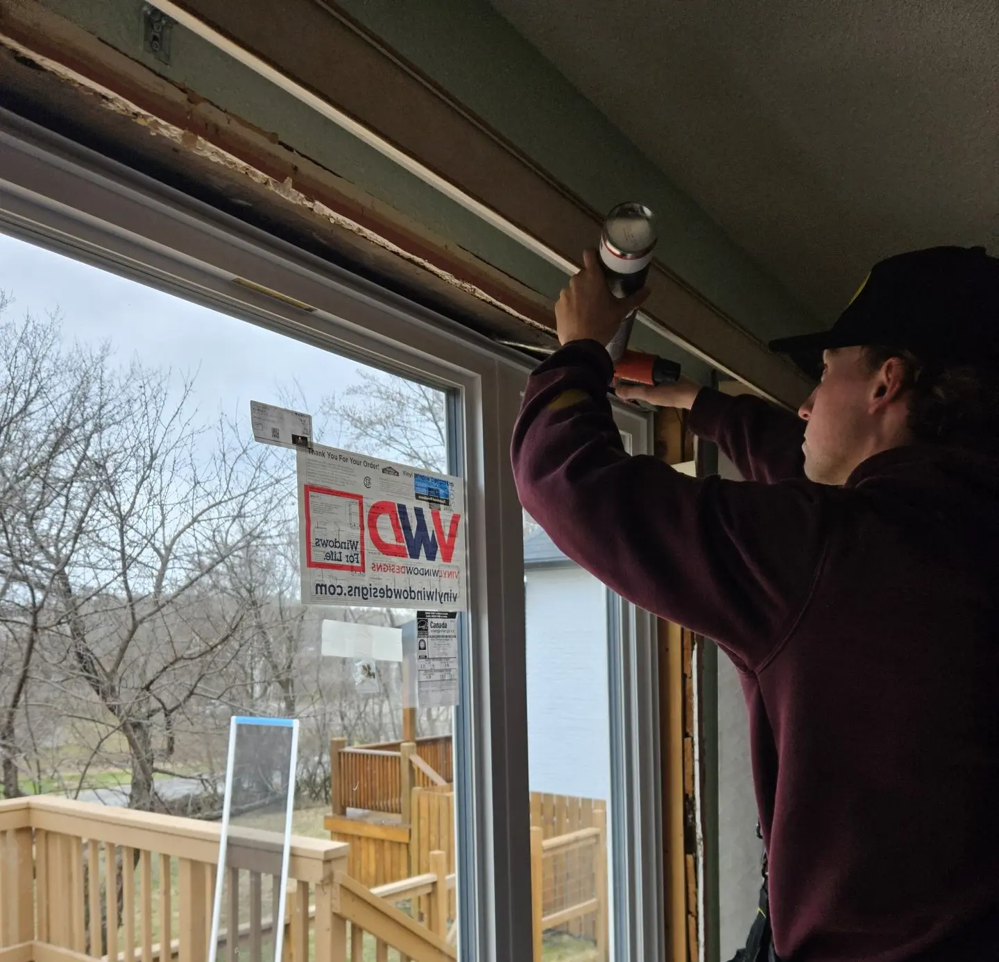 The Window & Door Store installer working on window