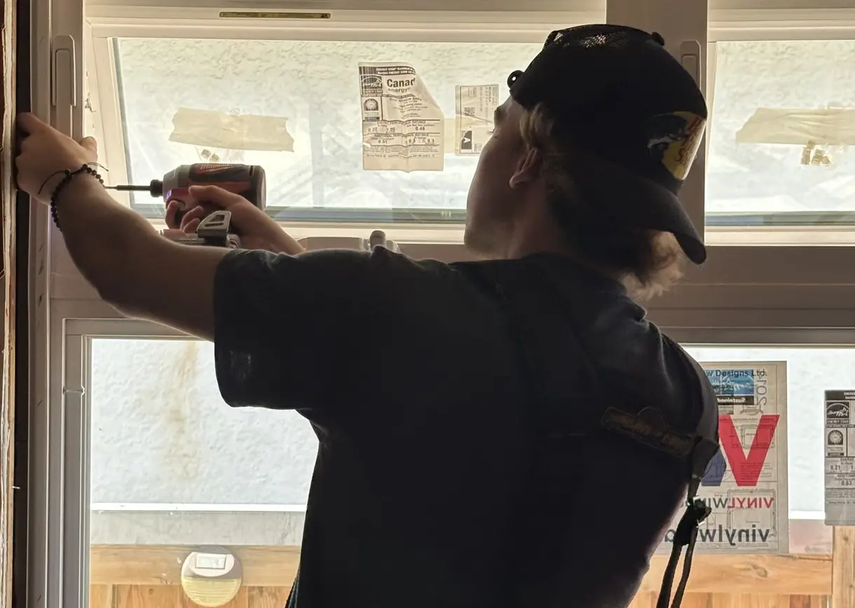 Installer working in new windows in Ontario Northwestern area, Fort Frances, Dryden, Kenora, Sioux Lookout